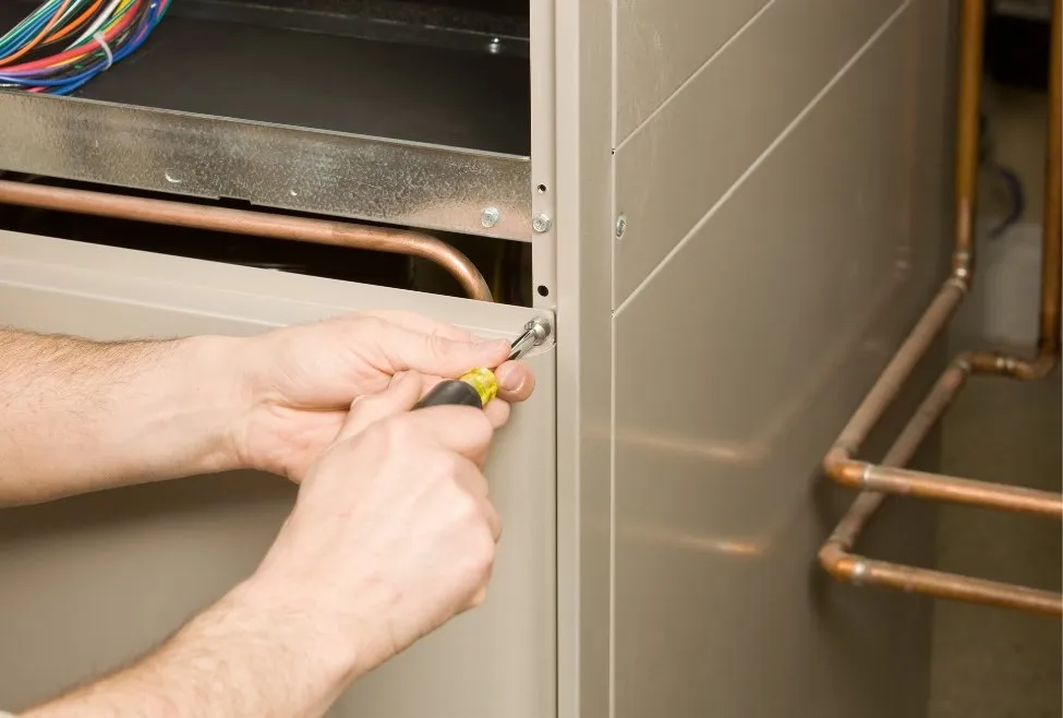 Furnace servicing by a technician, ensuring optimal performance with routine maintenance, how often should a furnace be serviced, expert furnace tune-up, professional heating system check-up, reliable furnace repair and maintenance services, seasonal furnace maintenance for energy efficiency, furnace service technician working on HVAC system. Call now for professional help with how often should a furnace be serviced, furnace maintenance schedule, furnace tune-up frequency, professional furnace servicing, furnace inspection intervals, HVAC maintenance services, furnace upkeep tips, seasonal furnace check-up, heating system maintenance, furnace maintenance near me, furnace tune-up near me, reliable furnace service, energy-efficient furnace maintenance, furnace cleaning services, regular furnace servicing, furnace technician near me, heating system inspection, furnace repair services, expert furnace maintenance, local furnace servicing, furnace care schedule, routine furnace check-ups.