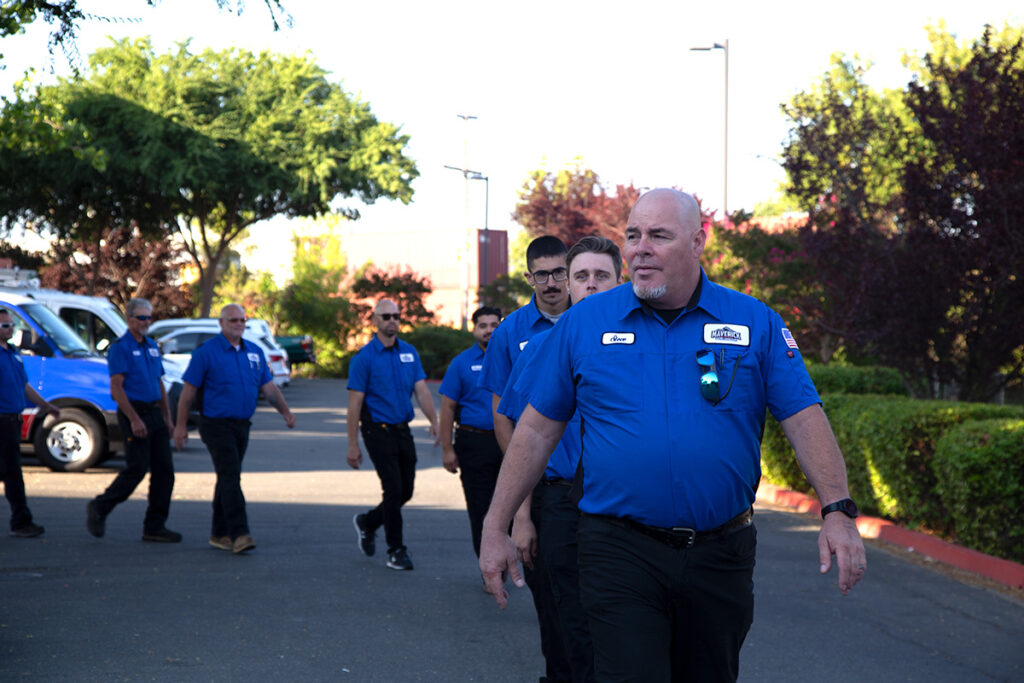 Maverick team members walking in a line